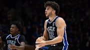 Dec 2, 2025; Durham, North Carolina, USA; Duke Blue Devils forward Cameron Boozer (12) reacts during the second half against the Florida Gators at Cameron Indoor Stadium.  The Blue Devils won 67-66. Mandatory Credit: Rob Kinnan-Imagn Images