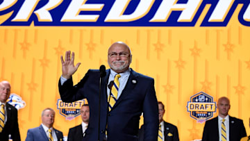 Jun 28, 2023; Nashville, Tennessee, USA; Nashville Predators incoming general manager Barry Trotz announces the twenty fourth pick in round one of the 2023 NHL Draft at Bridgestone Arena. Mandatory Credit: Christopher Hanewinckel-Imagn Images