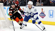 Mar 24, 2024; Anaheim, California, USA; Tampa Bay Lightning left wing Conor Sheary (73) passes from Anaheim Ducks center Ben Meyers (39) during the first period at Honda Center. Mandatory Credit: Jason Parkhurst-Imagn Images