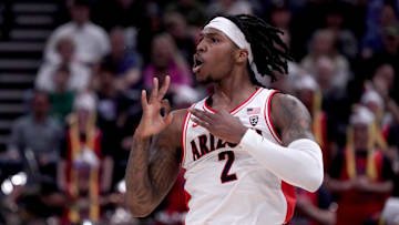Mar 23, 2024; Salt Lake City, UT, USA; Arizona Wildcats guard Caleb Love (2) reacts after a basket during the first half in the second round of the 2024 NCAA Tournament against the Dayton Flyers at Vivint Smart Home Arena-Delta Center. Mandatory Credit: Gabriel Mayberry-Imagn Images