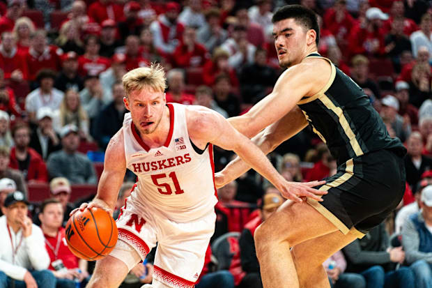 Nebraska Cornhuskers forward Rienk Mast drives against Purdue Boilermakers center Zach Edey.
