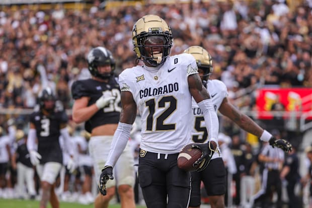 Sep 28, 2024; Orlando, Florida, USA; Colorado Buffaloes wide receiver Travis Hunter (12) scores a touchdown against the UCF K
