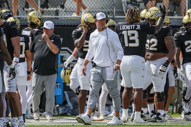 UCF coach Scott Frost looks on during the first quarter against North Carolina.