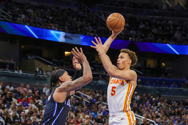 Atlanta Hawks guard Dyson Daniels shoots the ball over Orlando Magic forward Paolo Banchero.