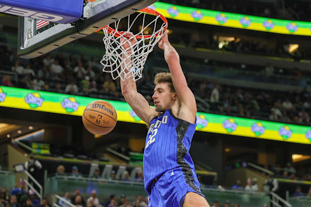 Franz Wagner of the Orlando Magic dunks during an NBA game versus the Brooklyn Nets