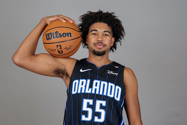 Orlando Magic guard Ethan Thompson (55) poses for a photo during Media Day at AdventHealth Training Center.