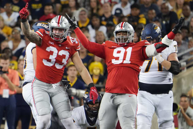 Defenders celebrate big play.