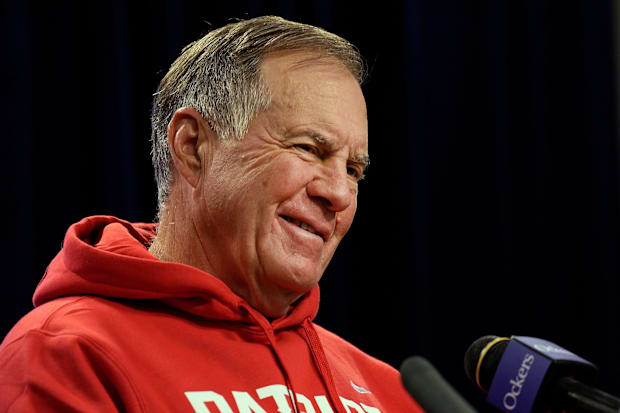 Bill Belichick smiles during questions at a press conference before a New England Patriots practice.