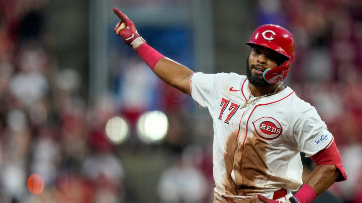 Cincinnati Reds right fielder Rece Hinds (77) hits a solo home run in the eighth inning of the MLB National League game between the Cincinnati Reds and the Colorado Rockies at Great American Ball Park in downtown Cincinnati on Monday, July 8, 2024. The Reds won the opening game of the series, 6-0.