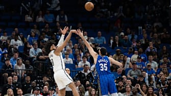 Brooklyn Nets forward Trendon Watford (9) shoots the ball over Orlando Magic center Goga Bitadze (35) in the fourth quarter at Kia Center. 