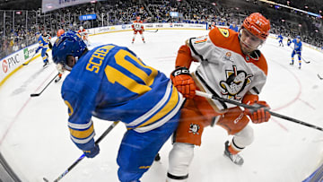 Dec 1, 2025; St. Louis, Missouri, USA; St. Louis Blues center Brayden Schenn (10) and Anaheim Ducks left wing Cutter Gauthier (61) battle for the puck during the second period at Enterprise Center. Mandatory Credit: Jeff Curry-Imagn Images