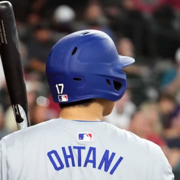 Sep 1, 2024; Phoenix, Arizona, USA; Los Angeles Dodgers two-way player Shohei Ohtani (17) looks on against the Arizona Diamondbacks during the second inning at Chase Field