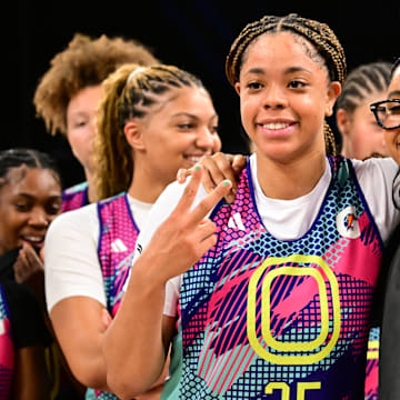 Trojans star JuJu Watkins (right) coached Saniyah Hall (left) during the Overtime Select Takeover weekend in June. Hall committed to USC a month later.