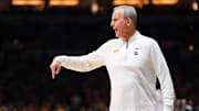 Tennessee head coach Rick Barnes sends out directions to the team during the NCAA Tournament Elite Eight game against Houston at Lucas Oil Stadium in Indianapolis, Ind., on Sunday, March 30, 2025.