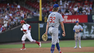 Jun 23, 2025; St. Louis, Missouri, USA; Chicago Cubs starting pitcher Ben Brown (32) watches as St. Louis Cardinals second baseman Brendan Donovan (33) rounds the bases after hitting a two-run home run in the fifth inning at Busch Stadium. Mandatory Credit: Joe Puetz-Imagn Images