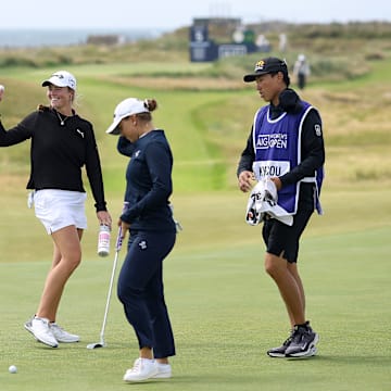 Mimi Rhodes of England celebrates a hole in one on the 5th hole during the final round of the 2025 AIG Women's Open at Royal Porthcawl in Wales.