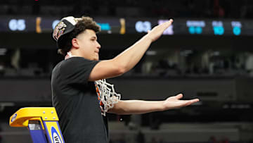 Apr 7, 2025; San Antonio, TX, USA; Florida Gators guard Walter Clayton Jr. (1) reacts after cutting down a piece of the net after winning the national championship game of the Final Four of the 2025 NCAA Tournament at the Alamodome. Mandatory Credit: Bob Donnan-Imagn Images