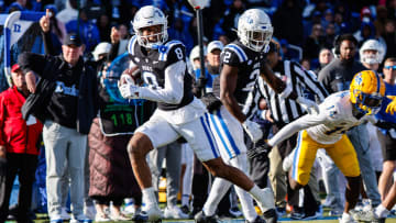 Nov 25, 2023; Durham, North Carolina, USA; Duke Blue Devils wide receiver Jordan Moore (8) runs with the ball towards the end zone during the second half of the game against Pittsburgh Panthers at Wallace Wade Stadium.