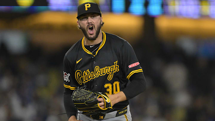 Pittsburgh Pirates starting pitcher Paul Skenes reacts after striking out Los Angeles Dodgers second baseman Tommy Edman. Pittsburgh Pirates starting pitcher Paul Skenes reacts after striking out Los Angeles Dodgers second baseman Tommy Edman.