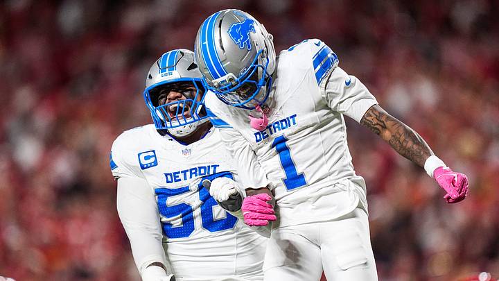 Detroit Lions wide receiver Jameson Williams (1) celebrates a touchdown against Kansas City Chiefs with offensive tackle Penei Sewell (58) during the first half at Arrowhead Stadium in Kansas City, Missouri on Sunday, Oct. 12, 2025.