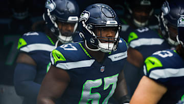 Nov 12, 2023; Seattle, Washington, USA; Seattle Seahawks offensive tackle Charles Cross (67) exits the locker room before a game against the Washington Commanders at Lumen Field. Mandatory Credit: Joe Nicholson-USA TODAY Sports