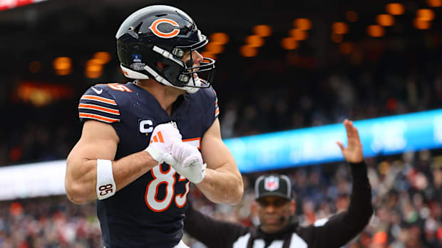 Chicago Bears tight end Cole Kmet (85) reacts after making a touchdown catch