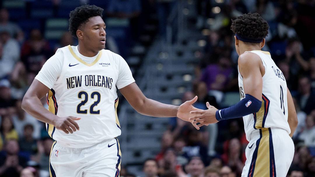 Dec 26, 2025; New Orleans, Louisiana, USA; New Orleans Pelicans center Derik Queen (22) celebrates a basket with guard Jeremiah Fears (0) during the first half against the Phoenix Suns at Smoothie King Center. Mandatory Credit: Matthew Hinton-Imagn Images Dec 26, 2025; New Orleans, Louisiana, USA; New Orleans Pelicans center Derik Queen (22) celebrates a basket with guard Jeremiah Fears (0) during the first half against the Phoenix Suns at Smoothie King Center. Mandatory Credit: Matthew Hinton-Imagn Images