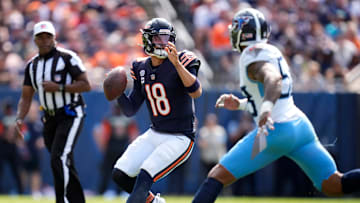 Chicago Bears quarterback Caleb Williams (18) plants to throw against the Tennessee Titans during the fourth quarter at Soldier Field in Chicago, Ill., Sunday, Sept. 8, 2024.