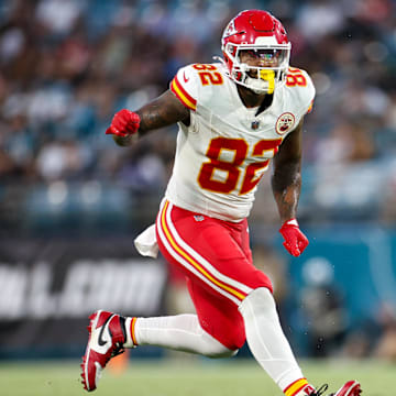 Aug 10, 2024; Jacksonville, Florida, USA; Kansas City Chiefs tight end Irv Smith (82) lines up against Jacksonville Jaguars safety Antonio Johnson (26) in the first quarter during preseason at EverBank Stadium. Mandatory Credit: Nathan Ray Seebeck-USA TODAY Sports