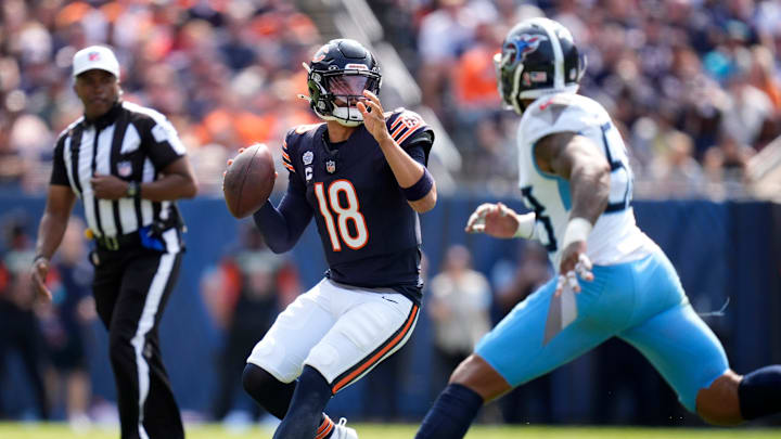 Chicago Bears quarterback Caleb Williams (18) plants to throw against the Tennessee Titans during the fourth quarter at Soldier Field in Chicago, Ill., Sunday, Sept. 8, 2024.