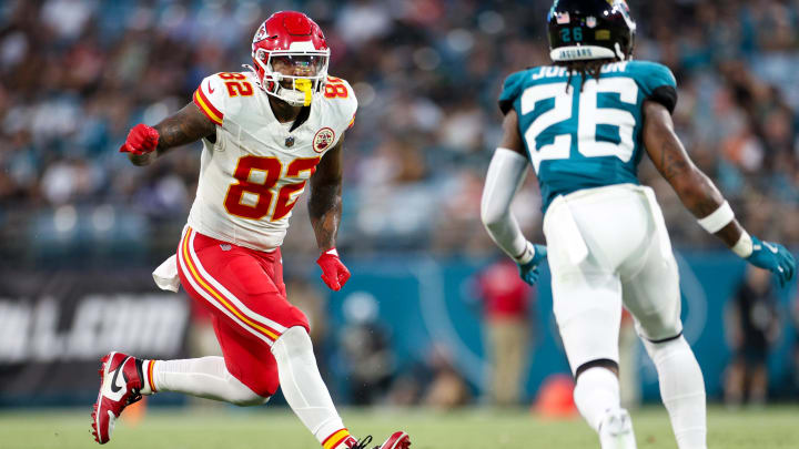 Aug 10, 2024; Jacksonville, Florida, USA; Kansas City Chiefs tight end Irv Smith (82) lines up against Jacksonville Jaguars safety Antonio Johnson (26) in the first quarter during preseason at EverBank Stadium. Mandatory Credit: Nathan Ray Seebeck-USA TODAY Sports