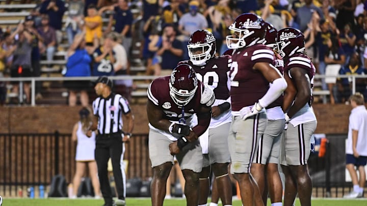 Mississippi State Bulldogs defenders react after a Toledo Rockets touchdown during the second quarter at Davis Wade Stadium at Scott Field.