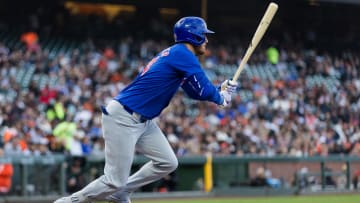 Jun 25, 2024; San Francisco, California, USA; Chicago Cubs right fielder Cody Bellinger (24) hits a single against the San Francisco Giants during the third inning at Oracle Park.