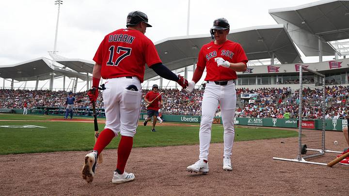 Feb 22, 2026; Fort Myers, Florida, USA;  Boston Red Sox designated hitter Roman Anthony (19) is congratulated by infielder Caleb Durbin (17) after he scored during the first inning at JetBlue Park at Fenway South. Mandatory Credit: Kim Klement Neitzel-Imagn Images