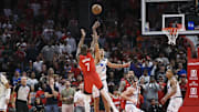 Nov 16, 2025; Houston, Texas, USA; Houston Rockets forward Kevin Durant (7) makes a basket as Orlando Magic forward Tristan da Silva (23) defends during overtime at Toyota Center. Mandatory Credit: Troy Taormina-Imagn Images