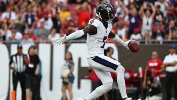Aug 26, 2023; Tampa, Florida, USA; Baltimore Ravens wide receiver Laquon Treadwell (5) runs the ball in for a touchdown against the Tampa Bay Buccaneers during the first quarter at Raymond James Stadium. Mandatory Credit: Kim Klement Neitzel-USA TODAY Sports
