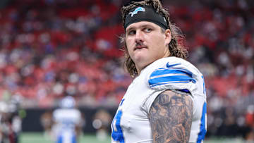 Detroit Lions guard Tate Ratledge (69) after an injury to safety Morice Norris (not pictured) against the Atlanta Falcons in the fourth quarter at Mercedes-Benz Stadium. 