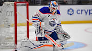 Apr 29, 2025; Los Angeles, California, USA; Edmonton Oilers goaltender Calvin Pickard (30) blocks a shot against the Los Angeles Kings during the second period in game five of the first round of the 2025 Stanley Cup Playoffs at Crypto.com Arena. Mandatory Credit: Gary A. Vasquez-Imagn Images