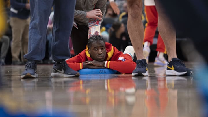 Dec 27, 2022; Indianapolis, Indiana, USA; Atlanta Hawks forward AJ Griffin (14) stretches before the game against the Indiana Pacers at Gainbridge Fieldhouse. Mandatory Credit: Armond Feffer-Imagn Images