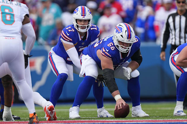 Connor McGovern about to snap the ball to Josh Allen