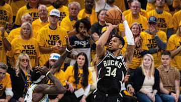 Apr 29, 2025; Indianapolis, Indiana, USA; Milwaukee Bucks forward Giannis Antetokounmpo (34) shoots the ball while  Indiana Pacers forward Pascal Siakam (43) defends during game five of the first round for the 2024 NBA Playoffs at Gainbridge Fieldhouse. Mandatory Credit: Trevor Ruszkowski-Imagn Images