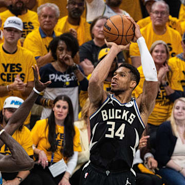 Apr 29, 2025; Indianapolis, Indiana, USA; Milwaukee Bucks forward Giannis Antetokounmpo (34) shoots the ball while  Indiana Pacers forward Pascal Siakam (43) defends during game five of the first round for the 2024 NBA Playoffs at Gainbridge Fieldhouse. Mandatory Credit: Trevor Ruszkowski-Imagn Images