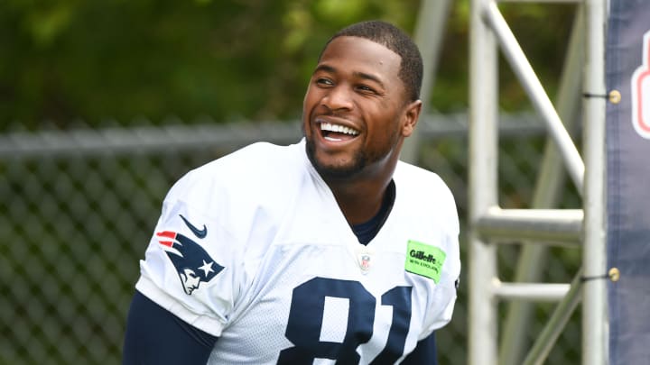 Jul 29, 2022; Foxborough, MA, USA; New England Patriots tight end Jonnu Smith (81) walks onto the field during training camp at Gillette Stadium. Mandatory Credit: Brian Fluharty-USA TODAY Sports