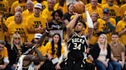 Milwaukee Bucks forward Giannis Antetokounmpo shoots the ball while  Indiana Pacers forward Pascal Siakam defends during game five of the first round for the 2024 NBA Playoffs at Gainbridge Fieldhouse. 