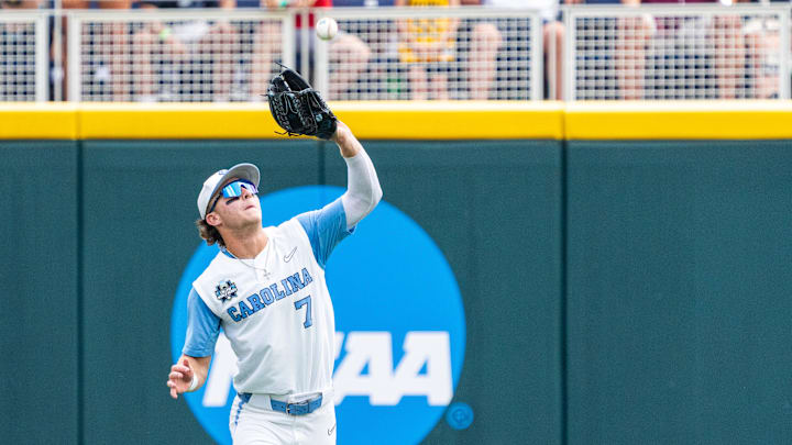 Jun 18, 2024; Omaha, NE, USA; North Carolina Tar Heels center fielder Vance Honeycutt (7) catches a fly ball for an out against the Florida State Seminoles during the fifth inning at Charles Schwab Field Omaha.