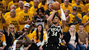 Milwaukee Bucks forward Giannis Antetokounmpo shoots the ball while  Indiana Pacers forward Pascal Siakam defends during game five of the first round for the 2024 NBA Playoffs at Gainbridge Fieldhouse. 
