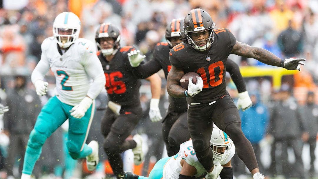 Oct 19, 2025; Cleveland, Ohio, USA; Cleveland Browns running back Quinshon Judkins (10) runs the ball for a touchdown against the Miami Dolphins during the second quarter at Huntington Bank Field. Mandatory Credit: Scott Galvin-Imagn Images