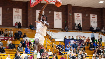 St. Joseph's Tounde Yessoufou (24) dunks the ball during the first round of the Capitol City Classic at Willamette University on Saturday, Dec. 16, 2023, in Salem, Ore.