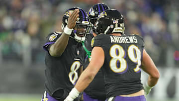 Dec 1, 2024; Baltimore, Maryland, USA; Baltimore Ravens tight end Mark Andrews (89) congratulated by quarterback Lamar Jackson (8) after his first quarter touchdown catch against the Philadelphia Eagles at M&T Bank Stadium.  