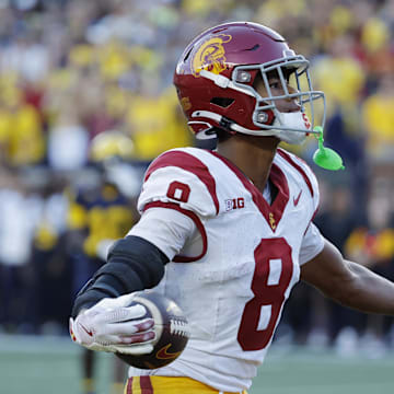 Sep 21, 2024; Ann Arbor, Michigan, USA;  USC Trojans wide receiver Ja'Kobi Lane (8) celebrates a touchdown in the second half against the Michigan Wolverines at Michigan Stadium. Mandatory Credit: Rick Osentoski-Imagn Images